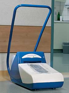 Galomat� Machine for shrink wrapping a plastic film around shoe soles<p>Save your clean room territories!!!